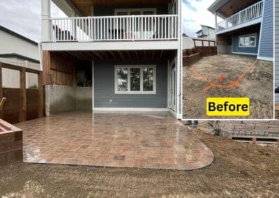 Outdoor landscaping with Roman paver walkway and patio in Regina